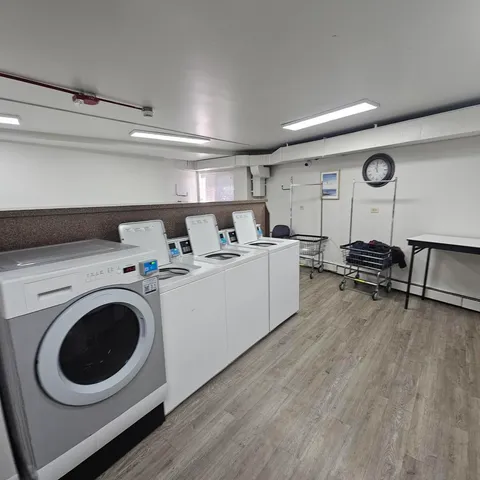 a view of a swimming pool with a yard