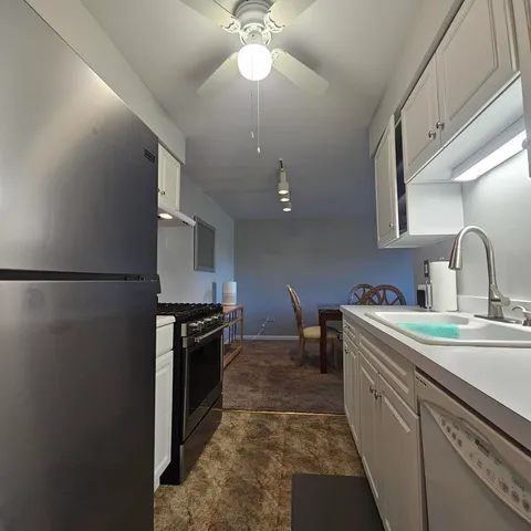 a view of a dining room with furniture