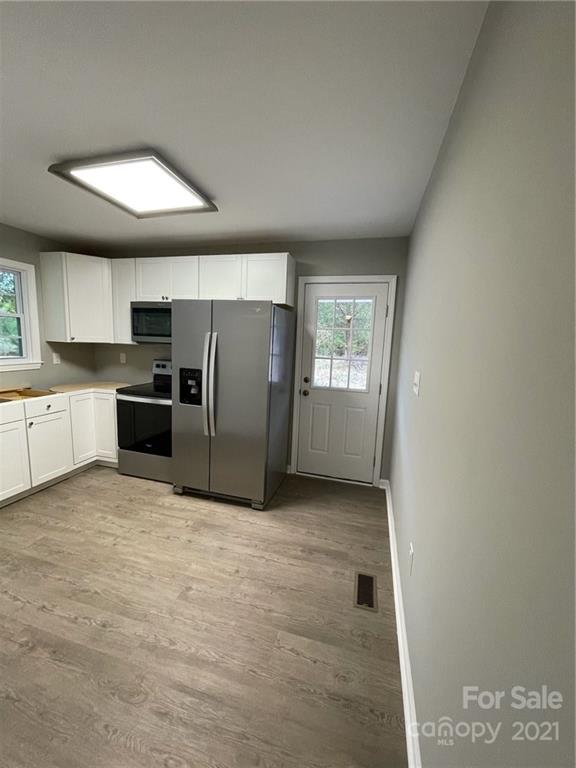 493 North Beersheba Road Clover, SC 29710 - Photo 3 of 7 a view of a kitchen with a sink and dishwasher kitchen view