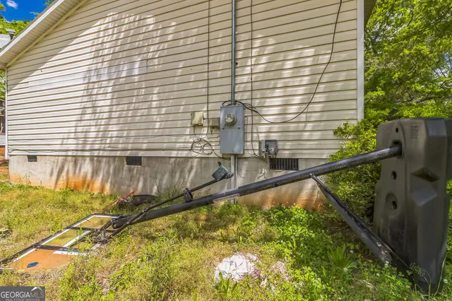 a view of balcony with tall trees