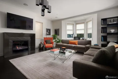 a view of a terrace with furniture and rug