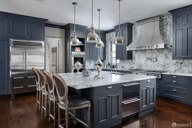a living room with furniture cabinets and a flat screen tv