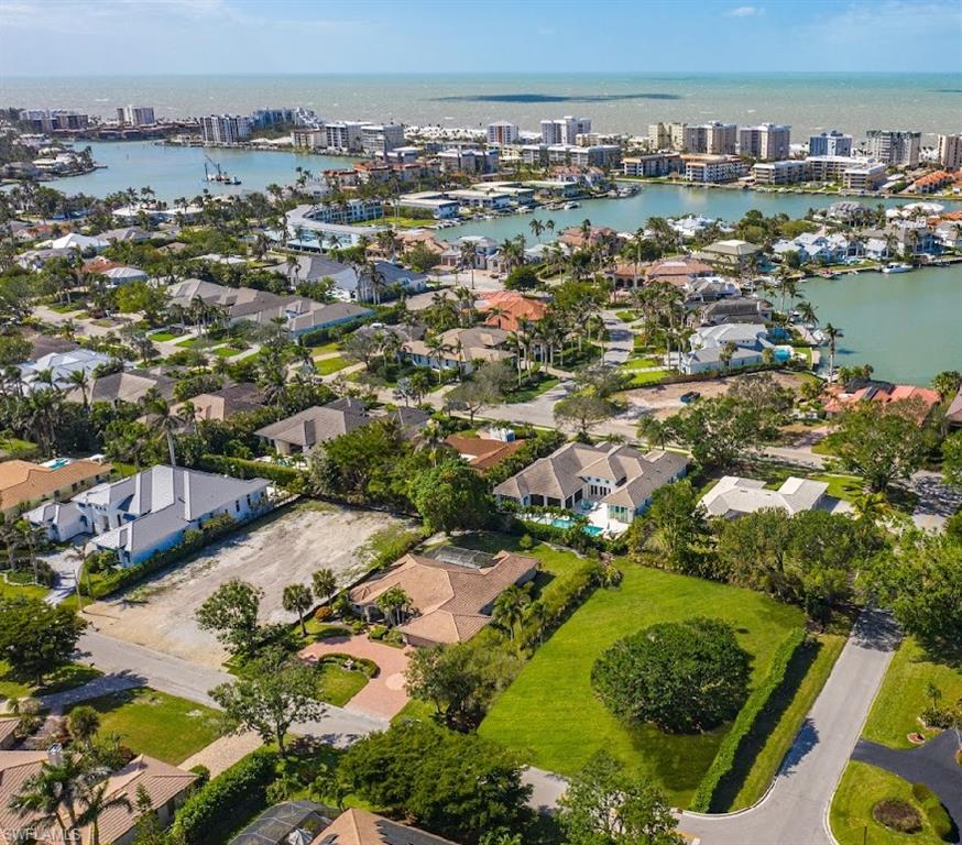 3215 Regatta Road Naples, FL 34103 - Photo 4 of 9 an aerial view of residential houses with outdoor space