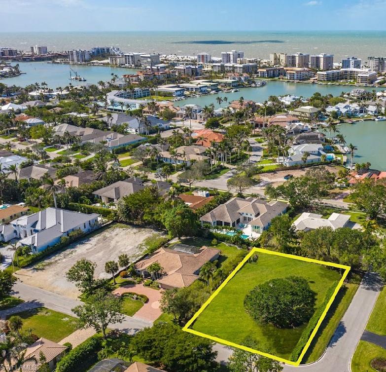 3215 Regatta Road Naples, FL 34103 - Photo 9 of 9 an aerial view of residential houses with outdoor space