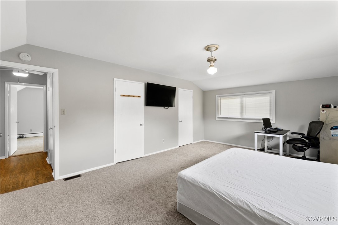 9219 Fisk Road Henrico, VA 23229 - Photo 16 of 18 Carpeted bedroom with a baseboard radiator and lof