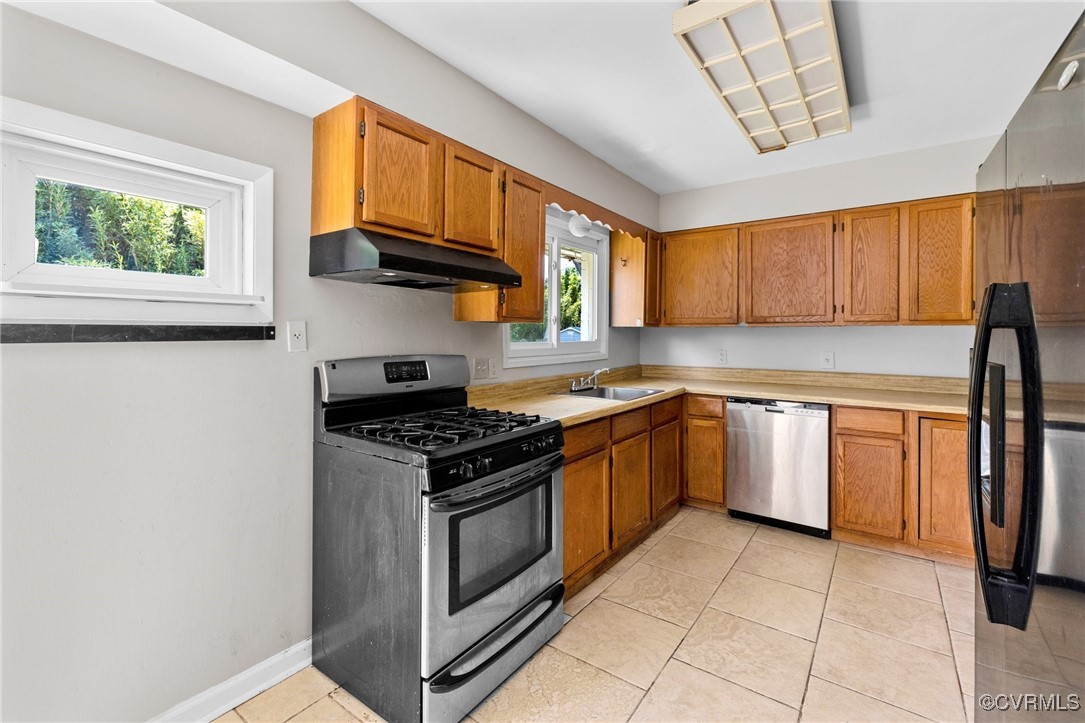 9219 Fisk Road Henrico, VA 23229 - Photo 6 of 18 Kitchen featuring light tile patterned flooring, s