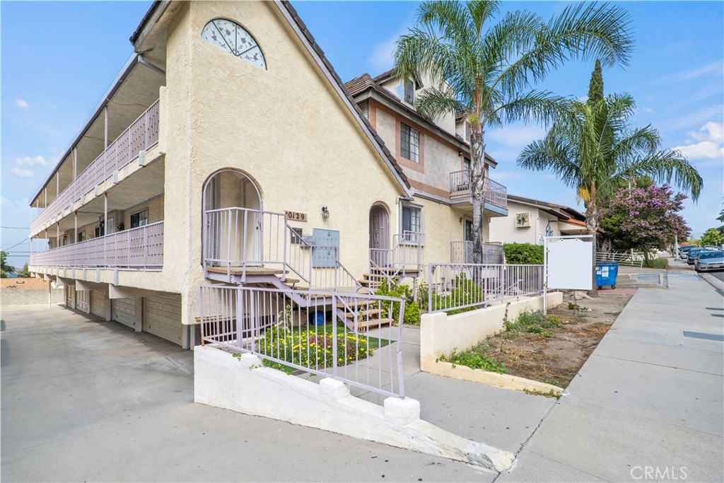 10219 Commerce Tujunga, CA 91042 - Photo 2 of 12 a front view of a house with a garden