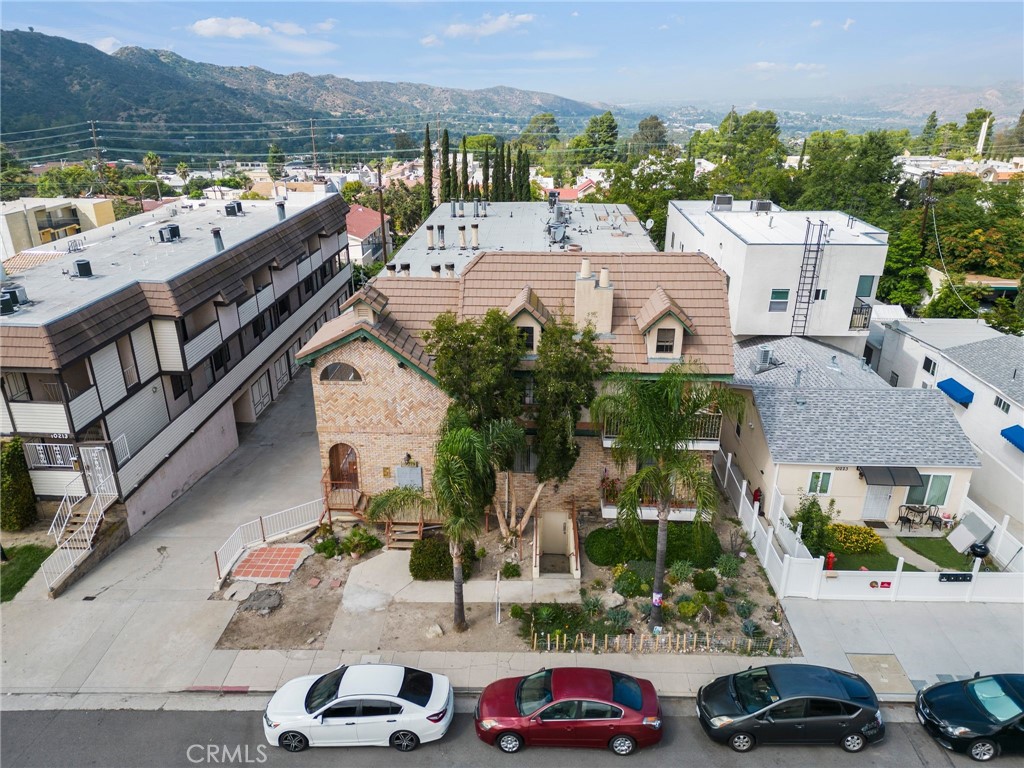 10219 Commerce Tujunga, CA 91042 - Photo 4 of 12 an aerial view of multiple houses with yard