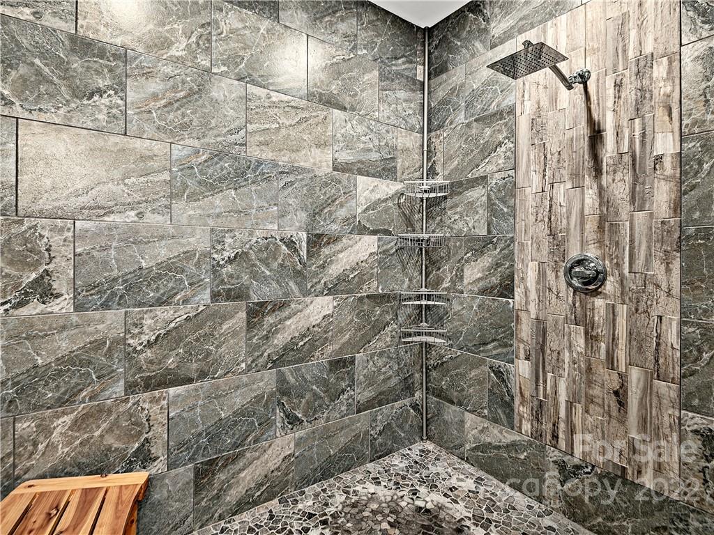 866 Pine Tree Road Spruce Pine, NC 28777 - Photo 19 of 38 a bathroom with a shower