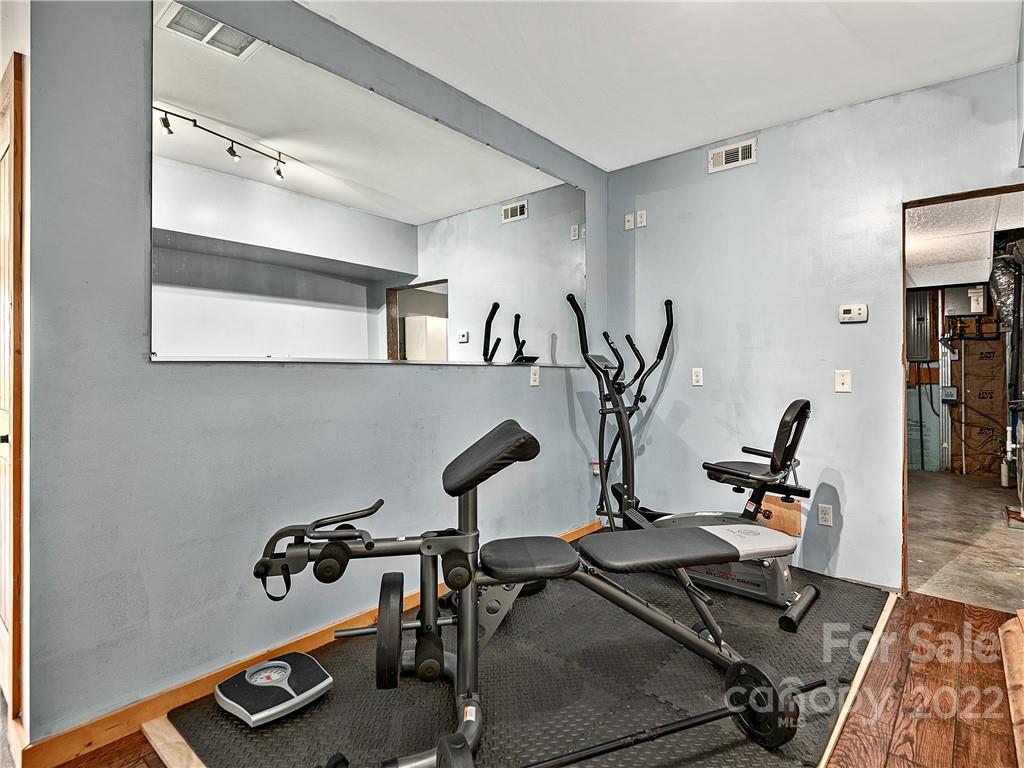 866 Pine Tree Road Spruce Pine, NC 28777 - Photo 20 of 38 a view of a room with gym equipment