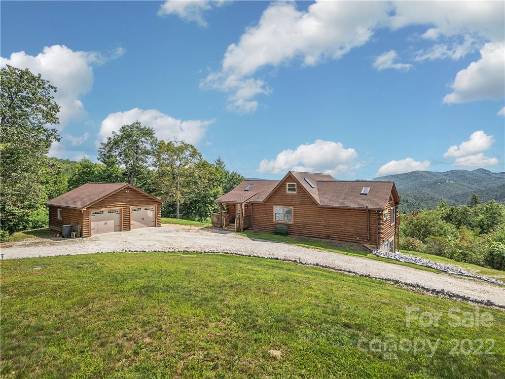 866 Pine Tree Road Spruce Pine, NC 28777 - Photo 33 of 38 a front view of a house with a yard