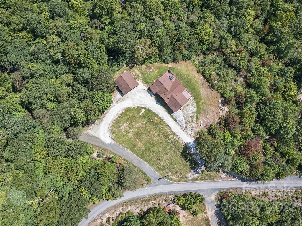 866 Pine Tree Road Spruce Pine, NC 28777 - Photo 38 of 38 a view of a forest from a balcony
