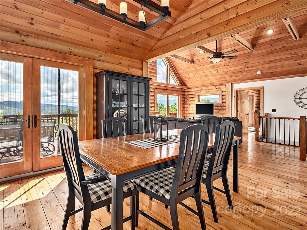 866 Pine Tree Road Spruce Pine, NC 28777 - Photo 5 of 38 a dining room with furniture window and wooden floor