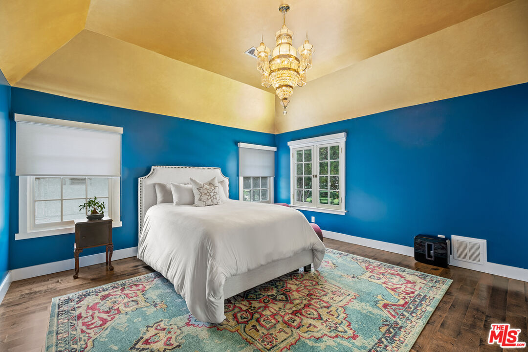 1632 Virginia Road Los Angeles, CA 90019 - Photo 18 of 26 a bed sitting in a bedroom next to a window