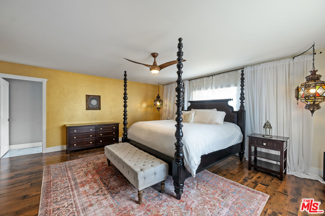 1632 Virginia Road Los Angeles, CA 90019 - Photo 20 of 26 a bed room with a bed and a dresser