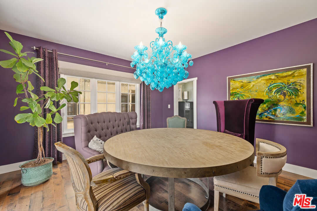 1632 Virginia Road Los Angeles, CA 90019 - Photo 5 of 26 a view of a dining room with furniture window and wooden floor