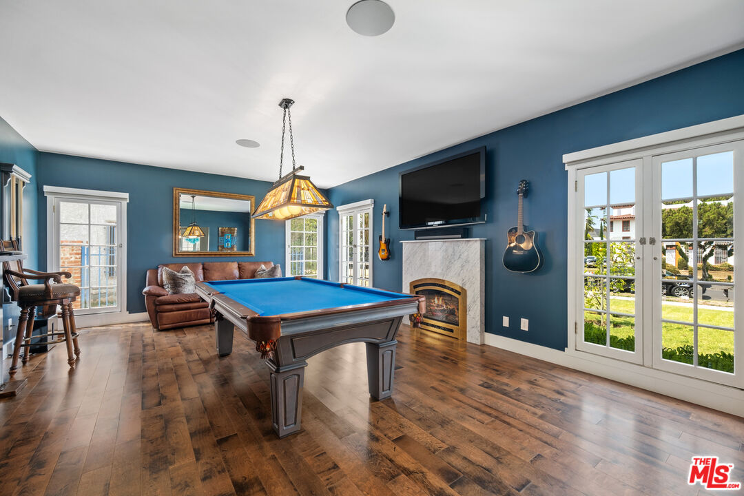 1632 Virginia Road Los Angeles, CA 90019 - Photo 6 of 26 a room with furniture pool table flat screen tv and a window