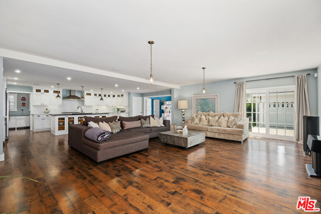 1632 Virginia Road Los Angeles, CA 90019 - Photo 10 of 26 a living room with furniture and a large window