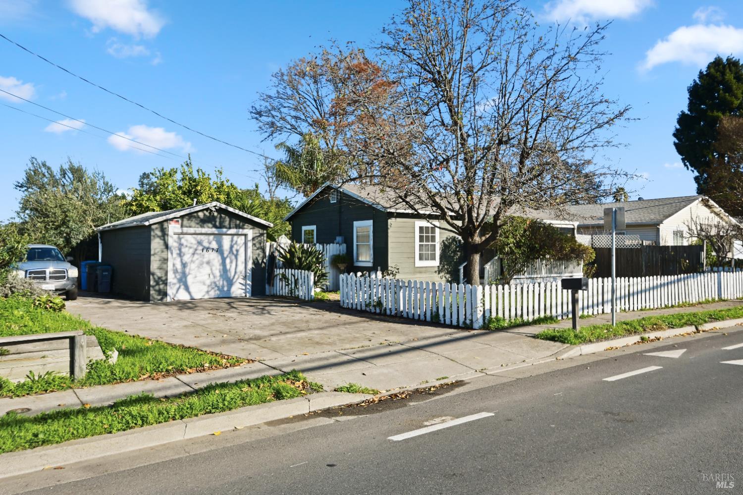 a house with trees in the background