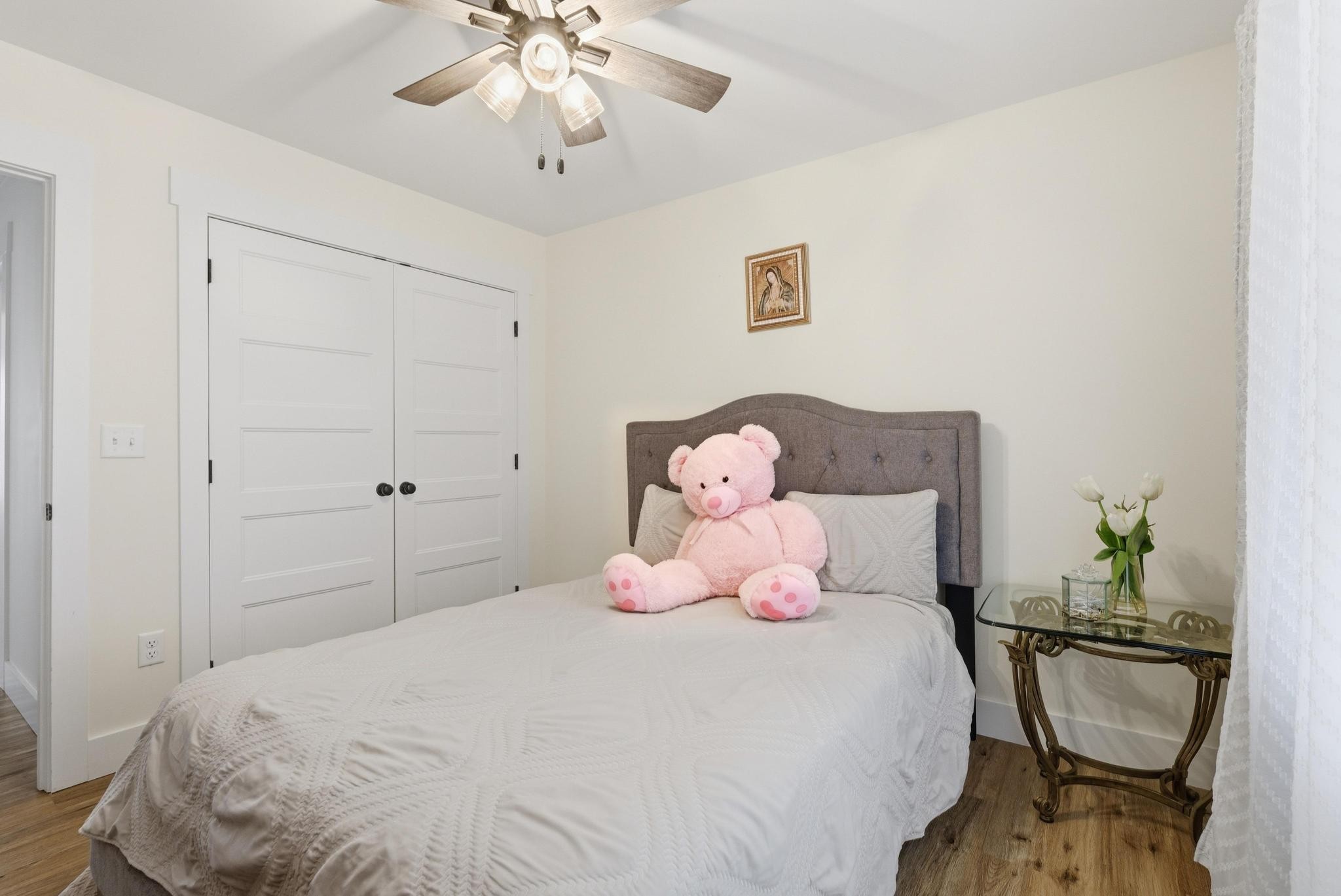514 Cottage Way Cookeville, TN 38506 - Photo 11 of 21 a bedroom with a bed and chandelier