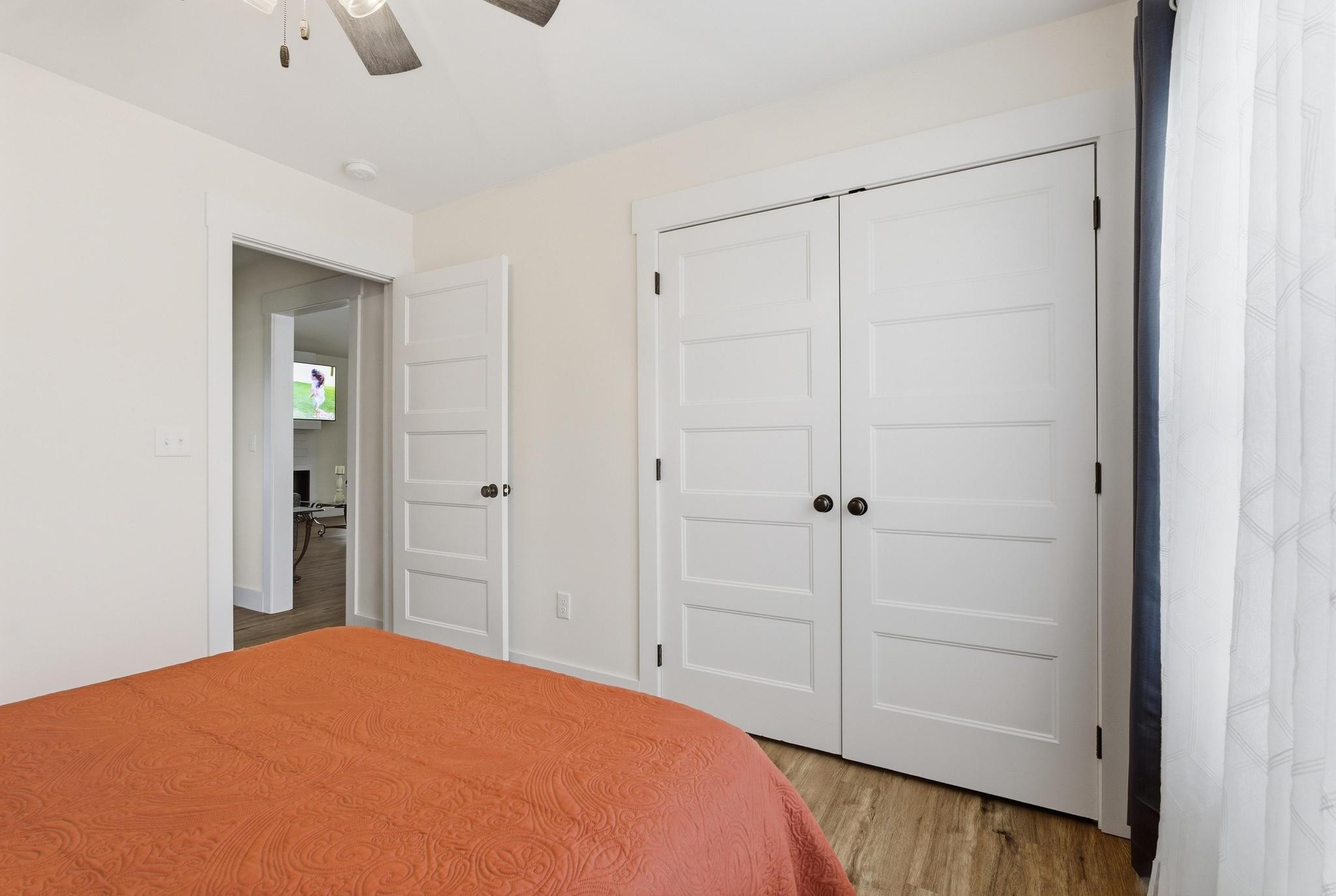 514 Cottage Way Cookeville, TN 38506 - Photo 14 of 21 a bedroom with a bed and a chandelier fan