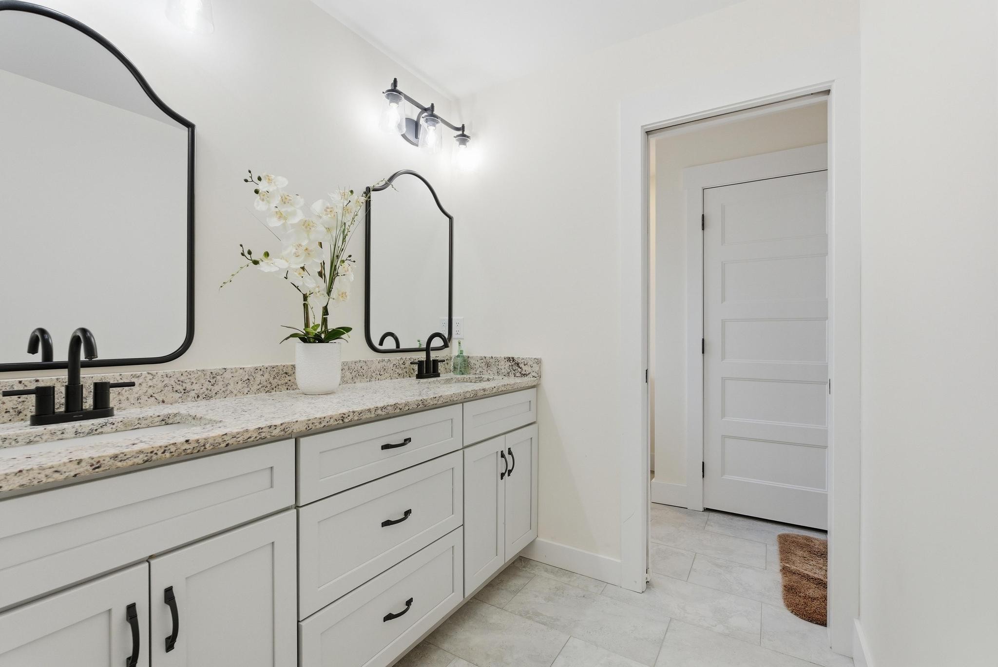 514 Cottage Way Cookeville, TN 38506 - Photo 15 of 21 a bathroom with a double vanity sink and a mirror