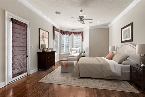 a view of a house with a garden and plants