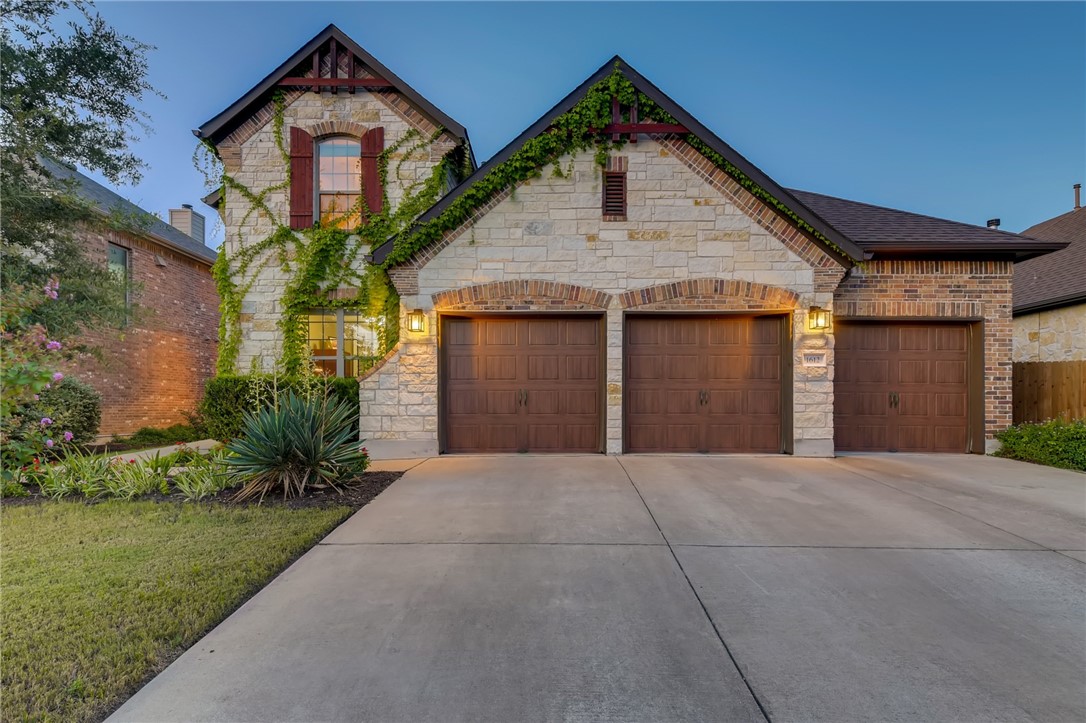 1612 Ambling Trail Cedar Park, TX 78613 - Photo 1 of 1 a front view of a house with a yard