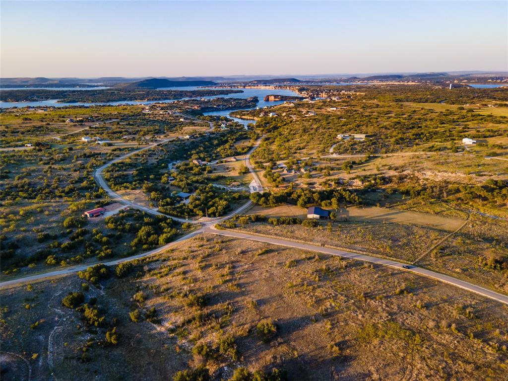 Lot 1 Pecan Cove Strawn, TX 76475 - Photo 17 of 25 an aerial view of residential building and ocean