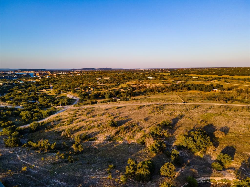 Lot 1 Pecan Cove Strawn, TX 76475 - Photo 20 of 25 an aerial view of residential building and ocean