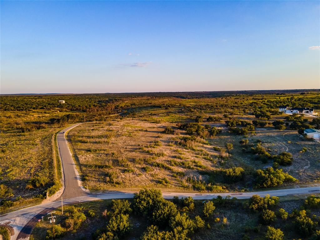 Lot 1 Pecan Cove Strawn, TX 76475 - Photo 3 of 25 an aerial view of residential building and ocean