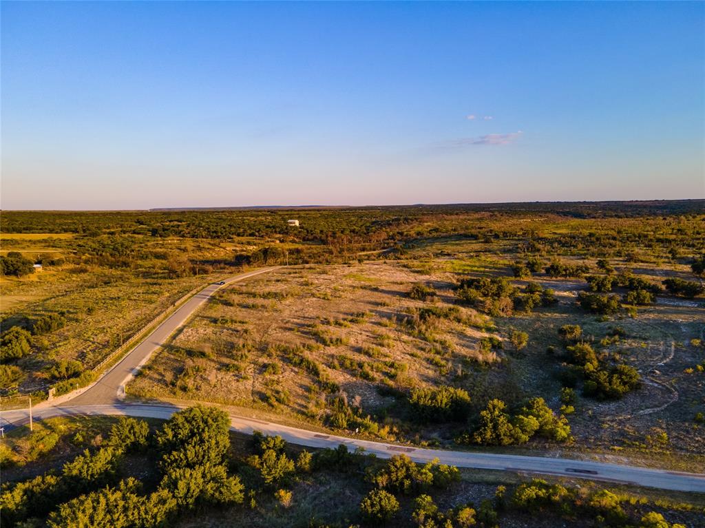 Lot 1 Pecan Cove Strawn, TX 76475 - Photo 4 of 25 an aerial view of residential building and ocean