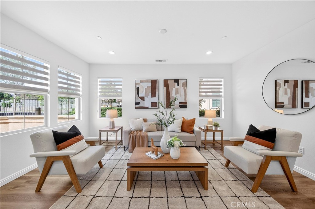 341 Adalina Lane Brea, CA 92821 - Photo 19 of 60 a living room with furniture a table and a large window