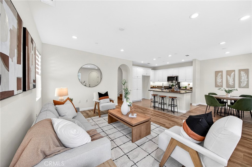 341 Adalina Lane Brea, CA 92821 - Photo 20 of 60 a living room with furniture kitchen view and a table