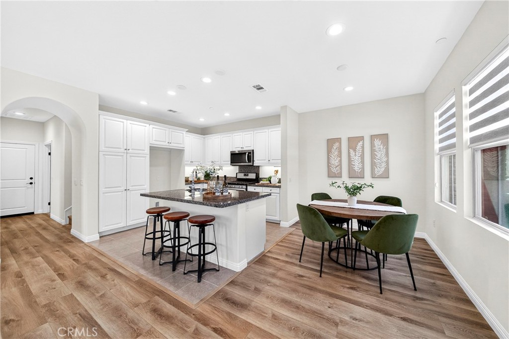 341 Adalina Lane Brea, CA 92821 - Photo 21 of 60 a kitchen with a table and chairs in it