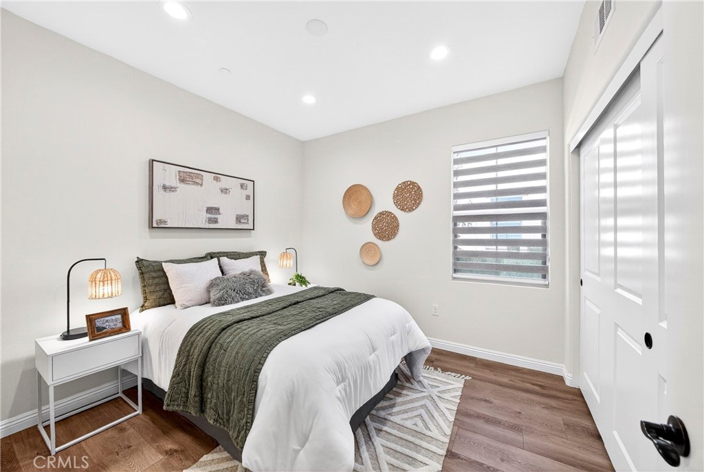 341 Adalina Lane Brea, CA 92821 - Photo 32 of 60 a bedroom with a bed and a window