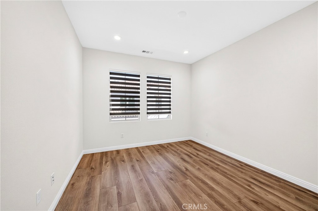 341 Adalina Lane Brea, CA 92821 - Photo 37 of 60 a view of a room with wooden floor and a window