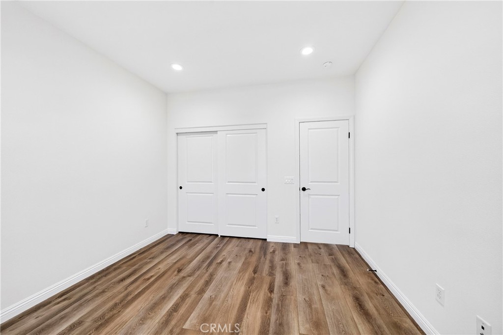 341 Adalina Lane Brea, CA 92821 - Photo 38 of 60 a view of a room with wooden floor and white walls