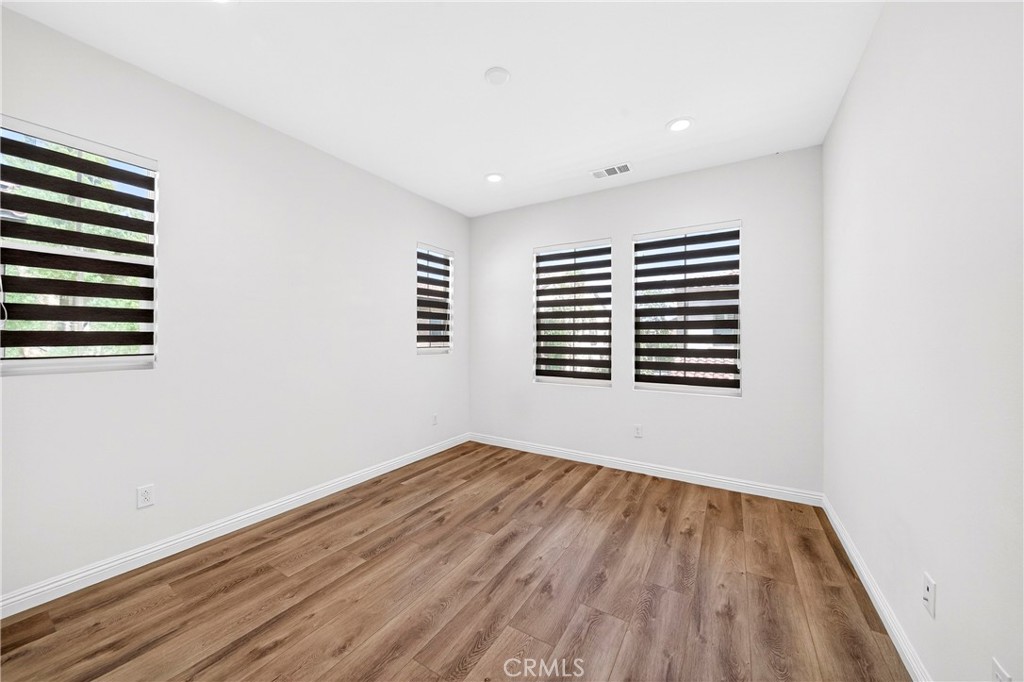 341 Adalina Lane Brea, CA 92821 - Photo 39 of 60 a view of empty room with wooden floor and fan