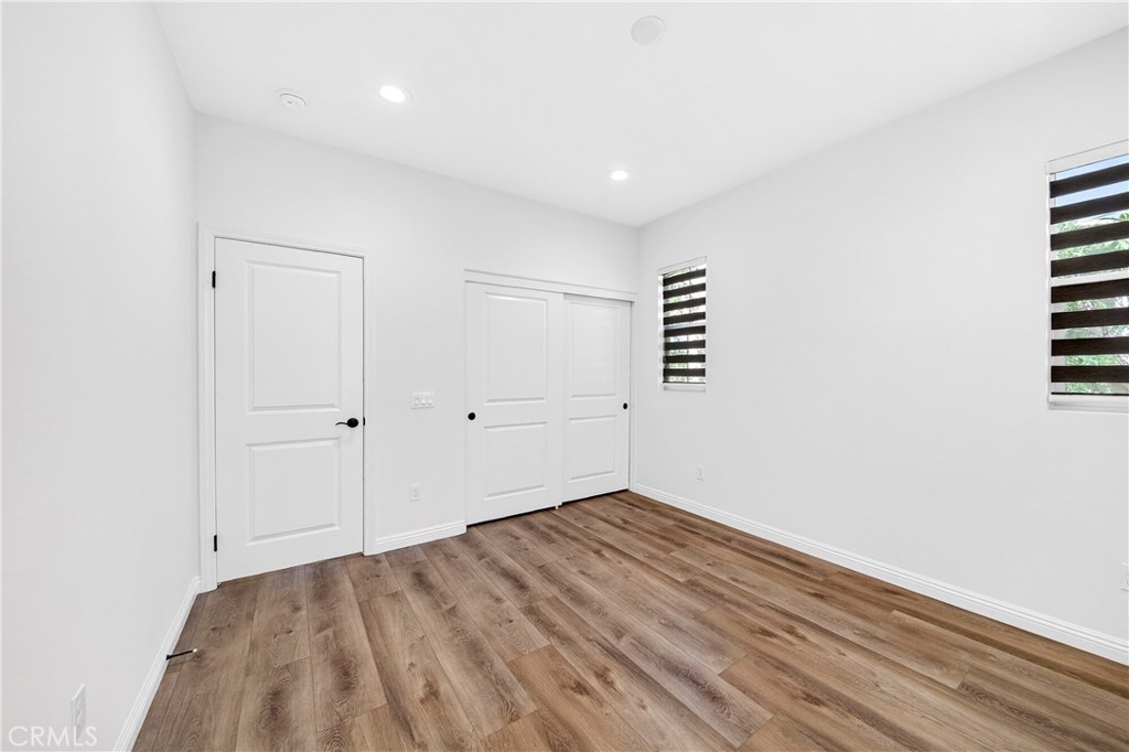 341 Adalina Lane Brea, CA 92821 - Photo 40 of 60 a view of a room with wooden floor and white walls