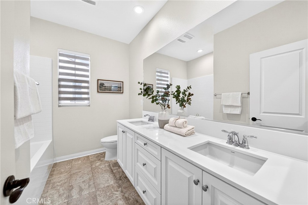 341 Adalina Lane Brea, CA 92821 - Photo 41 of 60 a bathroom with a sink a toilet and a mirror