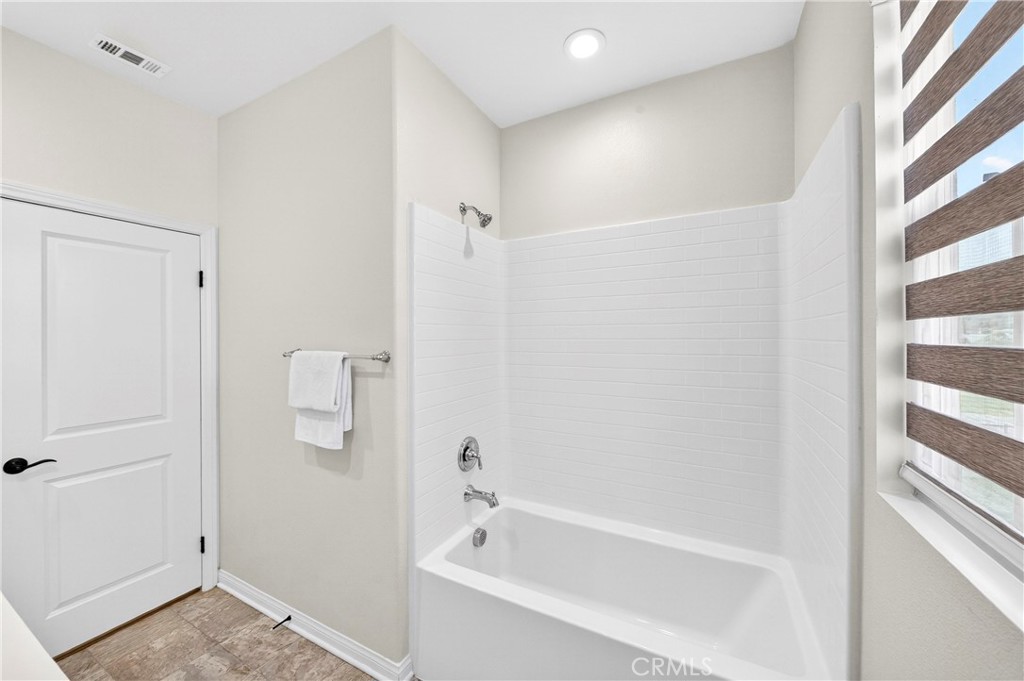 341 Adalina Lane Brea, CA 92821 - Photo 42 of 60 a bathroom with a tub and shower