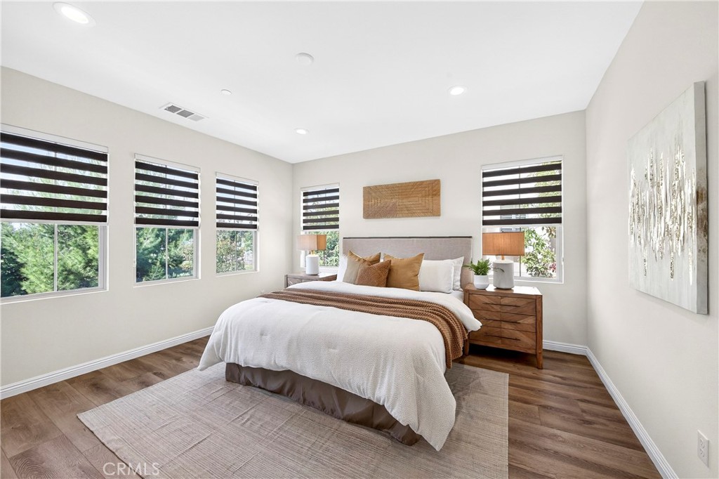 341 Adalina Lane Brea, CA 92821 - Photo 45 of 60 a bedroom with a bed and a large window