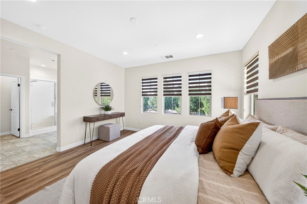 341 Adalina Lane Brea, CA 92821 - Photo 46 of 60 a bedroom with a bed and a large window