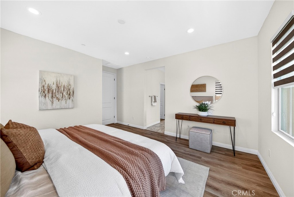 341 Adalina Lane Brea, CA 92821 - Photo 48 of 60 a bedroom with a bed and a table