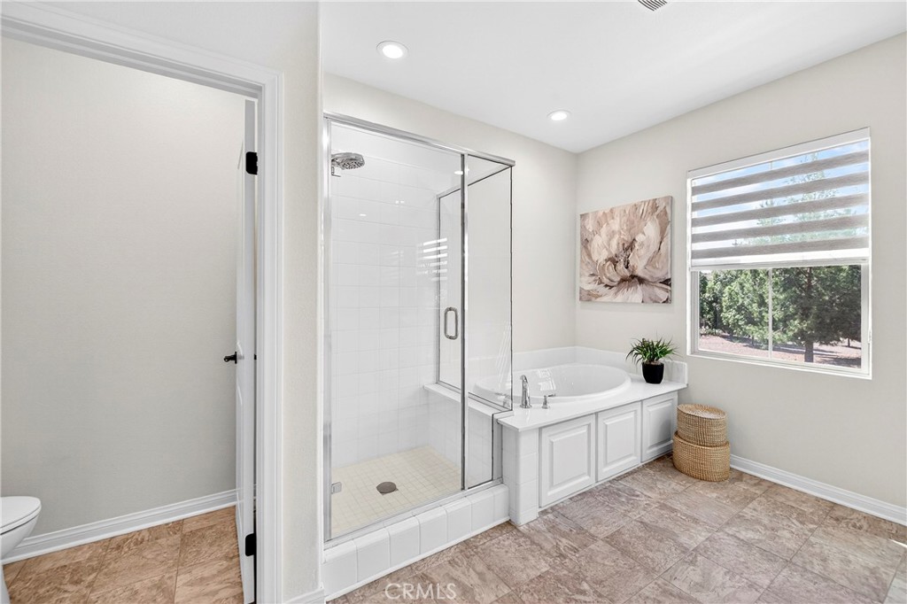 341 Adalina Lane Brea, CA 92821 - Photo 52 of 60 a bathroom with a tub a sink and a window