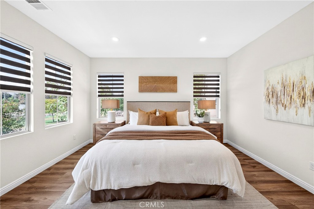 341 Adalina Lane Brea, CA 92821 - Photo 56 of 60 a bedroom with a large bed and a window