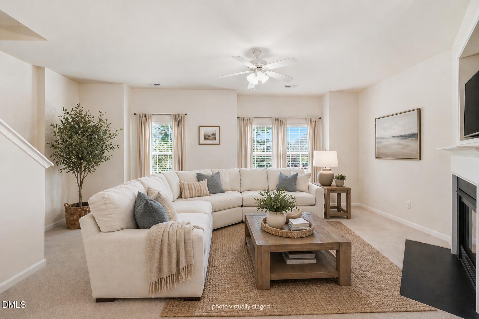903 Straywhite Avenue Apex, NC 27539 - Photo 11 of 37 a living room with furniture and a large window
