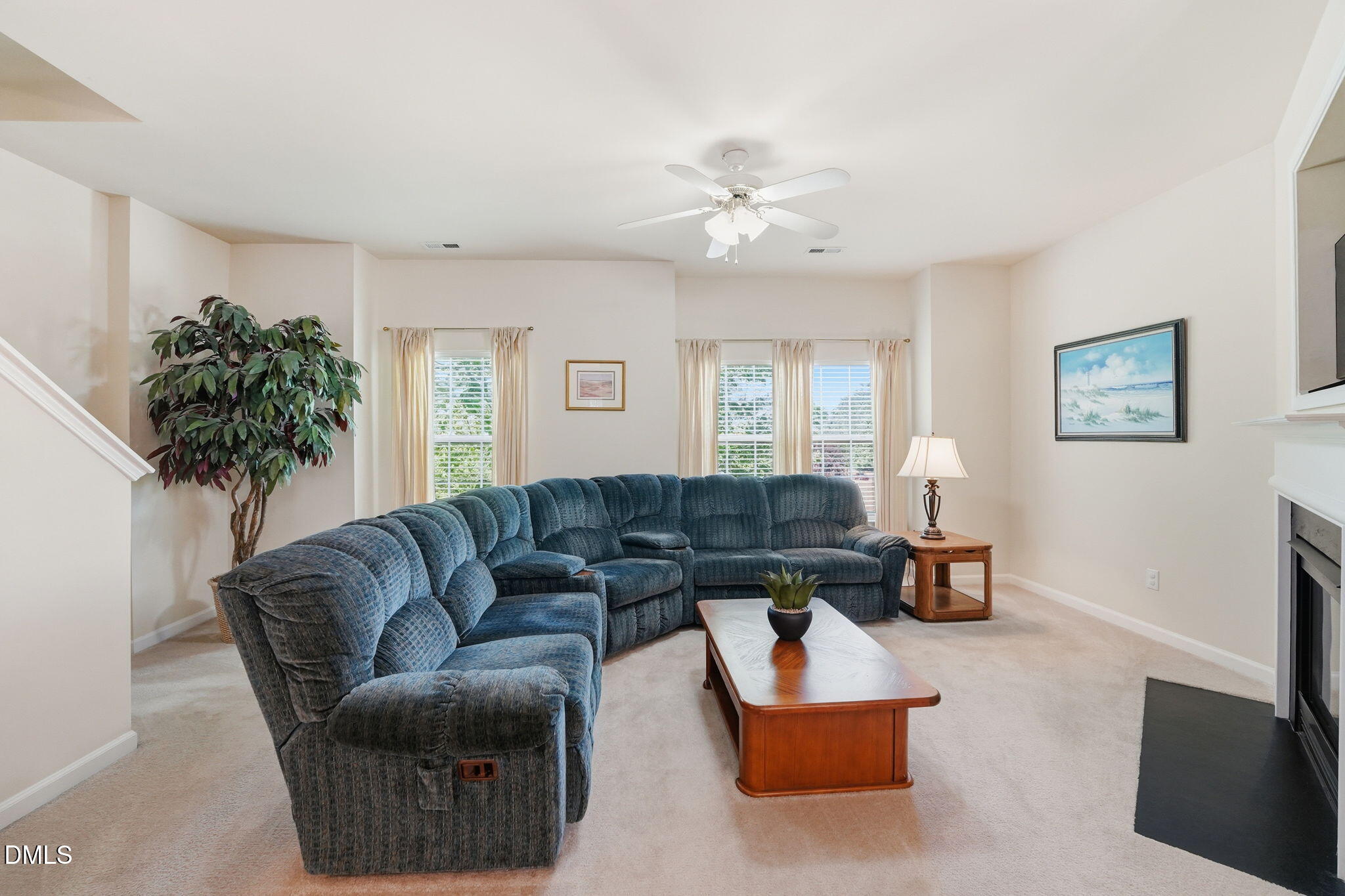 903 Straywhite Avenue Apex, NC 27539 - Photo 12 of 37 a living room with furniture and a large window
