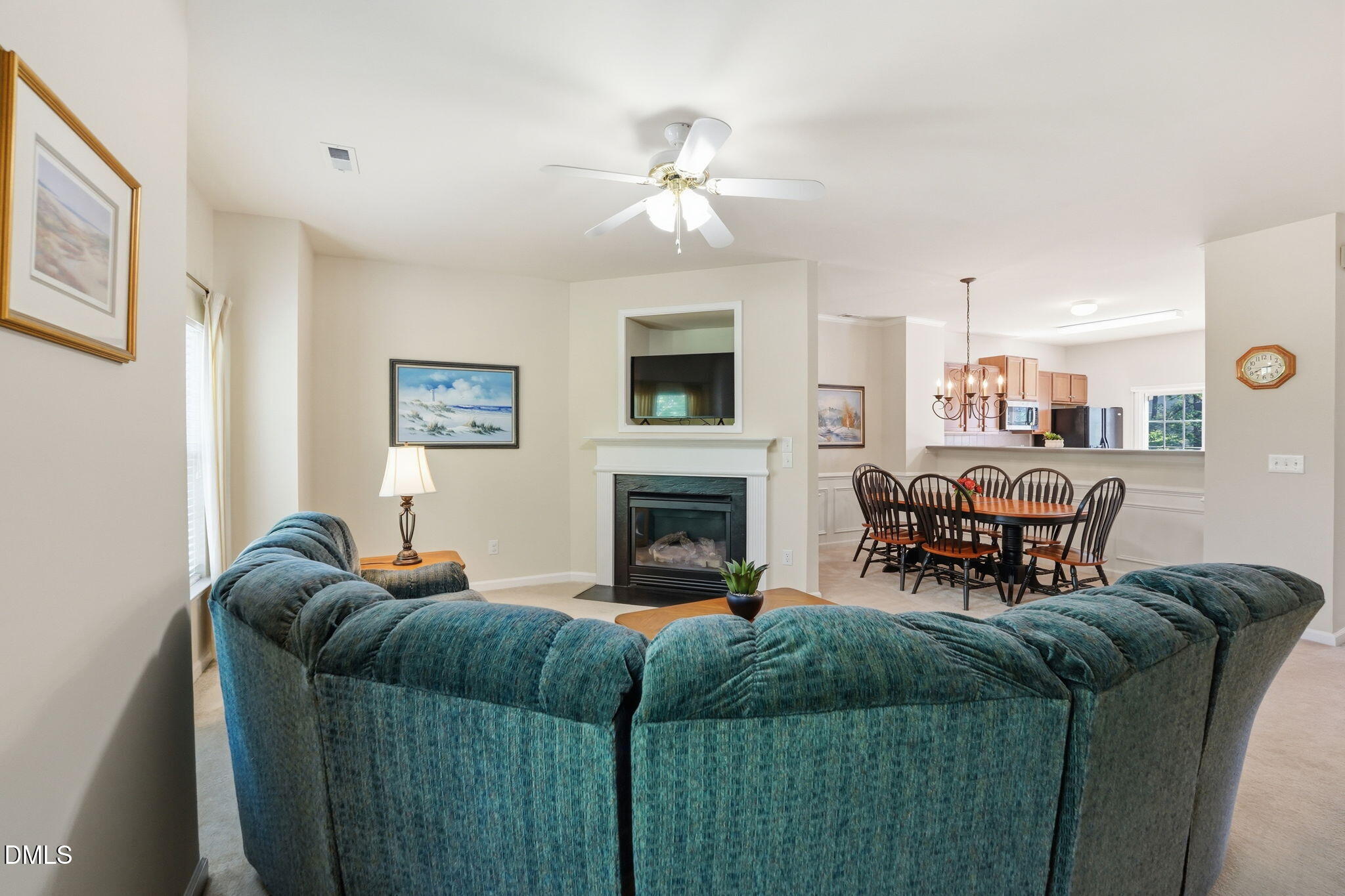 903 Straywhite Avenue Apex, NC 27539 - Photo 13 of 37 a living room with furniture and a fireplace